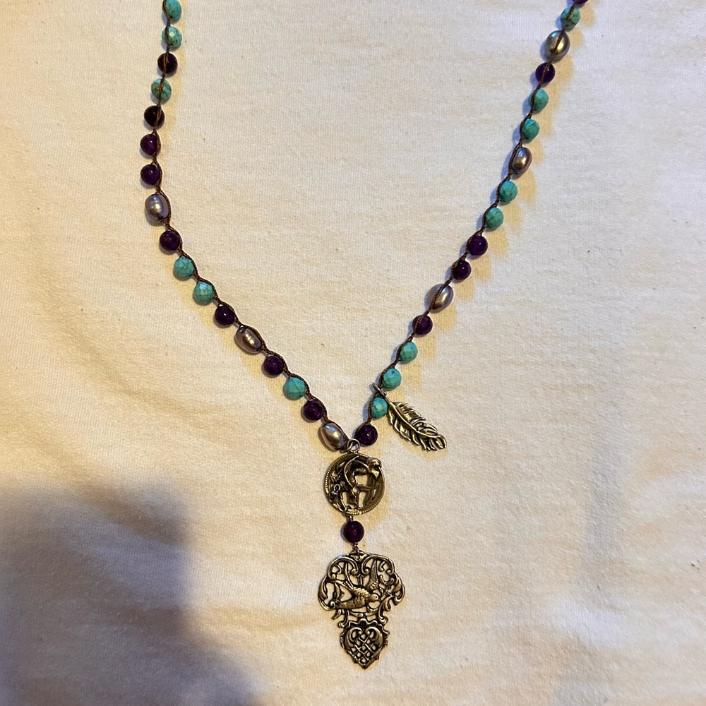 Bird and Crown blue and purple necklace